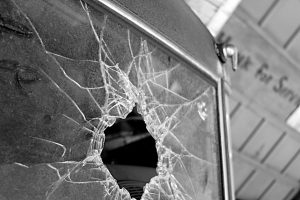 Broken Glass Monochromatic image of shattered windshield of vintage car in old garage